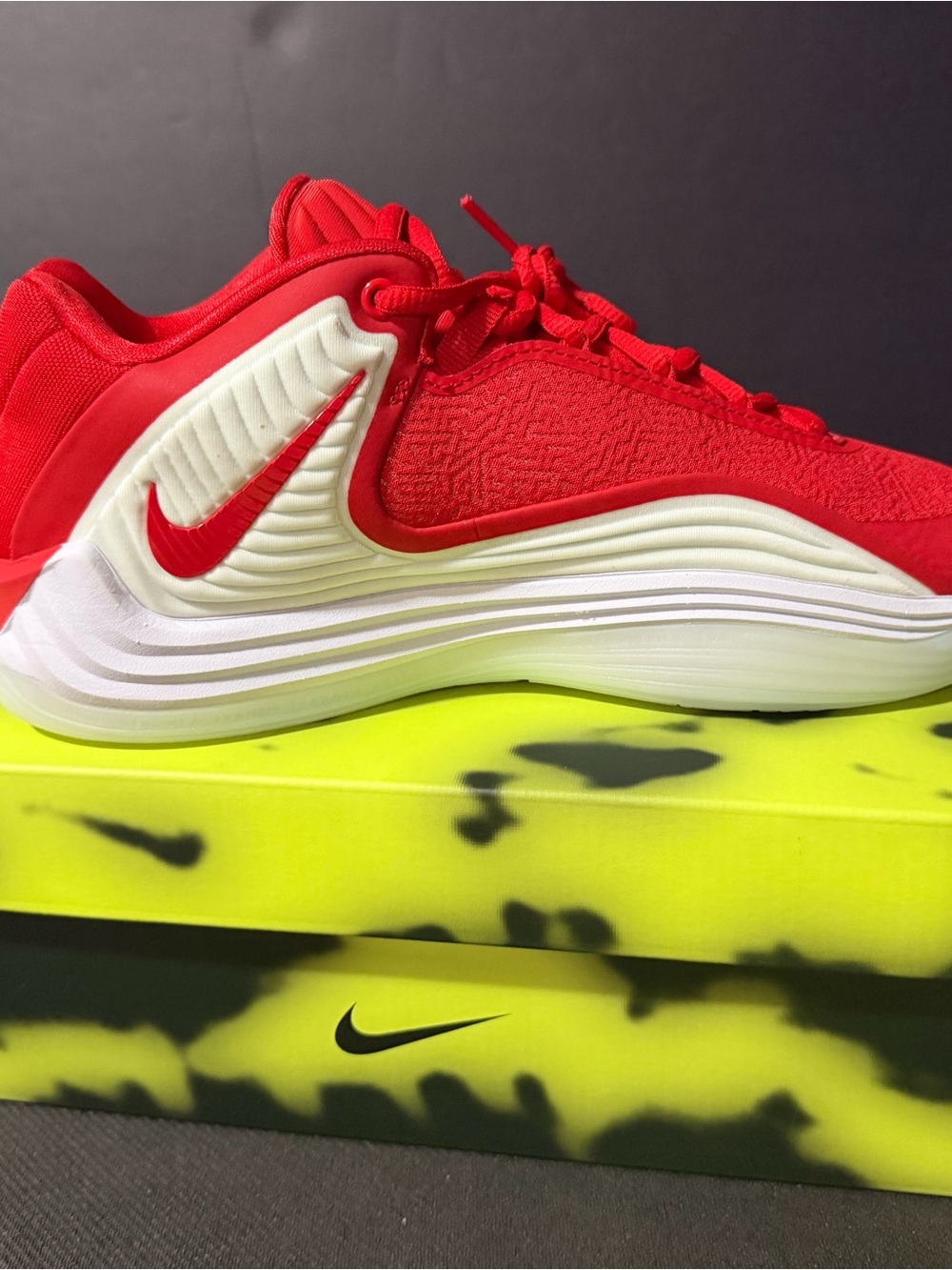 Nike Red Running Shoe with White Midsole and Neon Yellow Accents